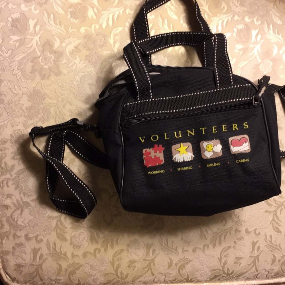 Volunteers small handbag with shoulder strap